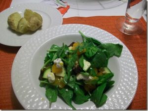 small baked potato and salad