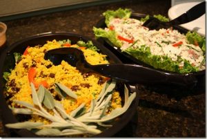 Potato Salad on the right made with Blue Cheese Crumbles